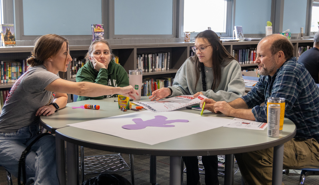 staff discussing project