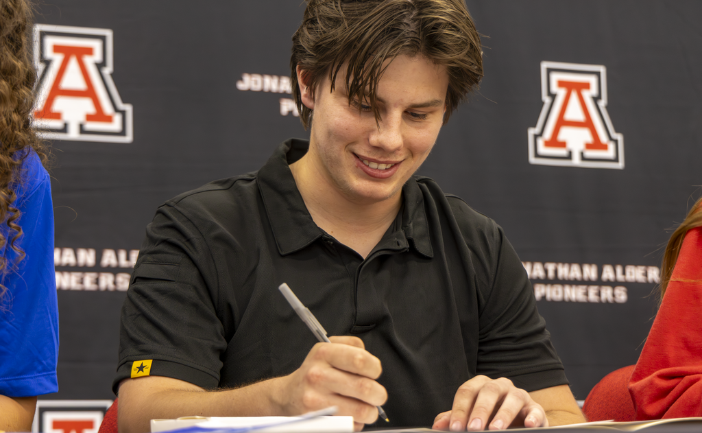 student signing