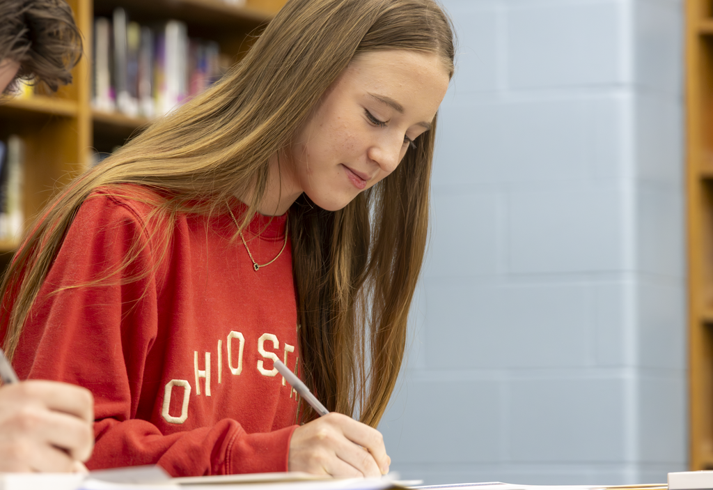 student signing
