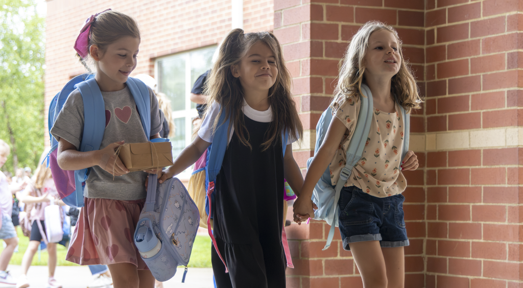 students walking and smiling 