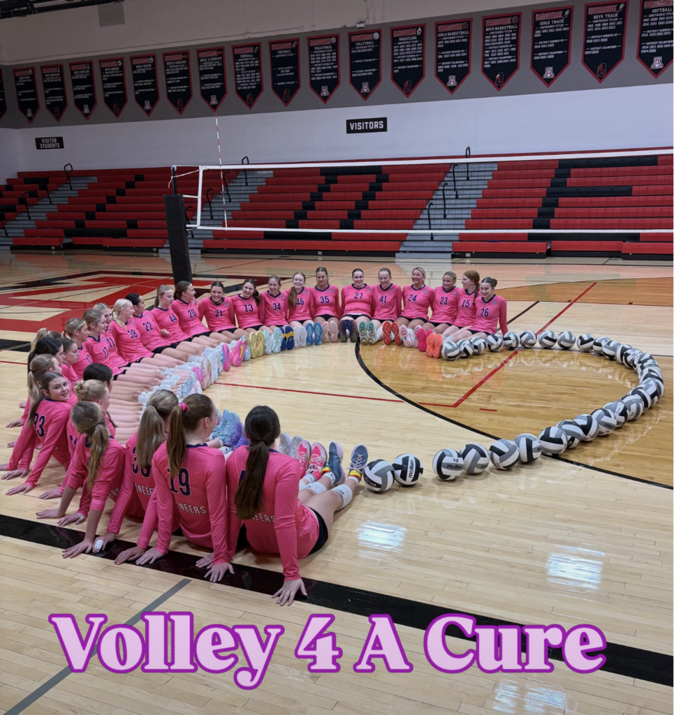 volleyball team forming a heart