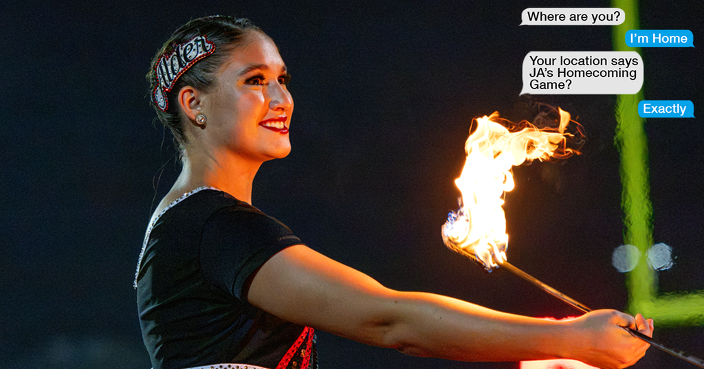 majorette with flame baton
