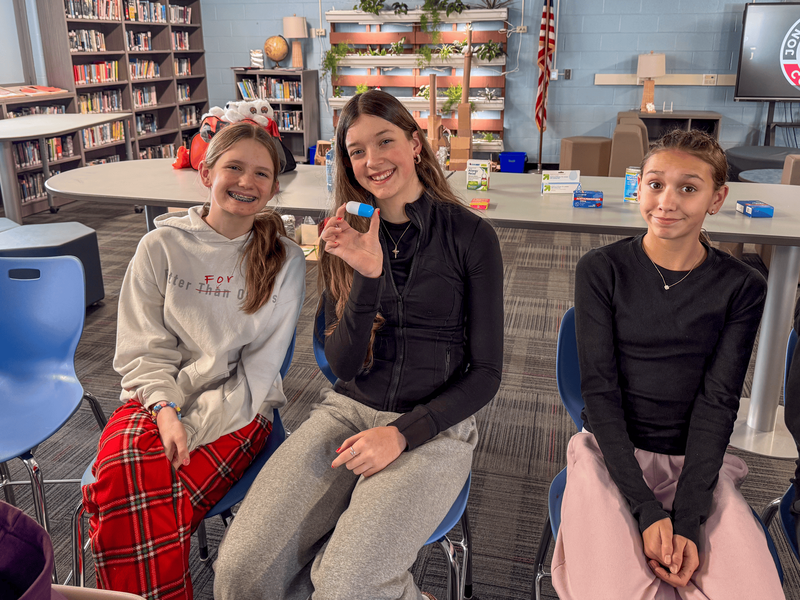 junior high students smiling