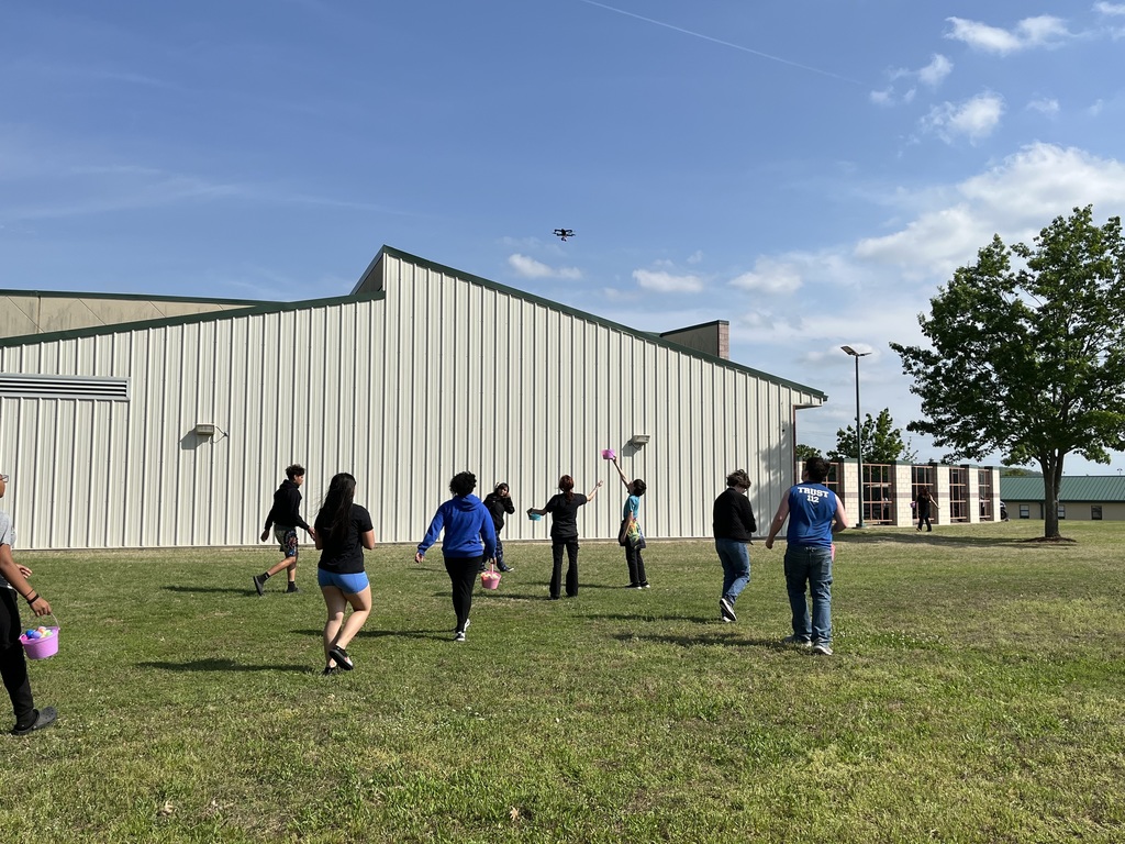 High Schoolers waiting for eggs to be dropped from drone