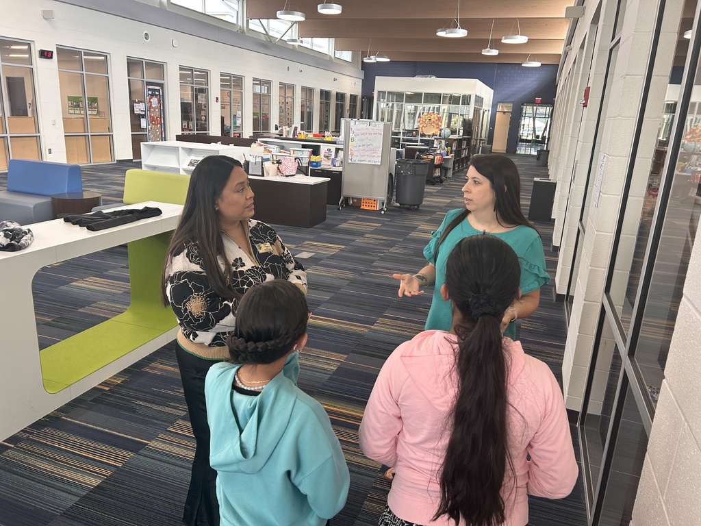 Ms. Higgins describing Trenton Elementary to Ms. Candaso