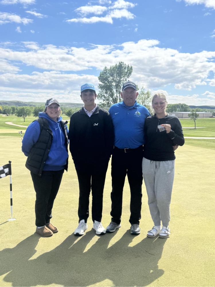 Coach Lily Flynn, Joey Rankin, Coach Bruce Venard, Tayah Anderson, picture on golf course after award ceremony for state golf qualifiers