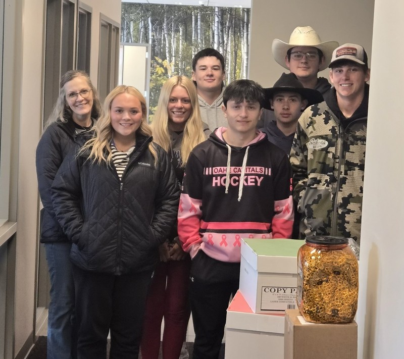 Seniors Unloading pop tabs at  Rionald McDonald House