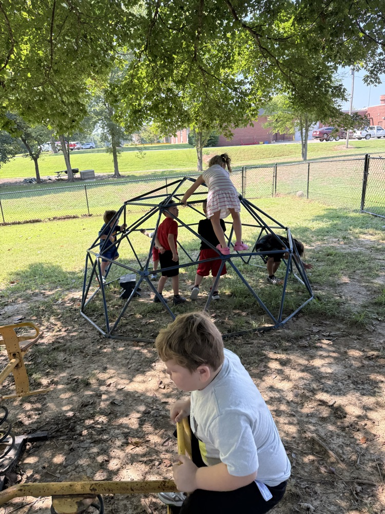 Enjoying the shade on the playground