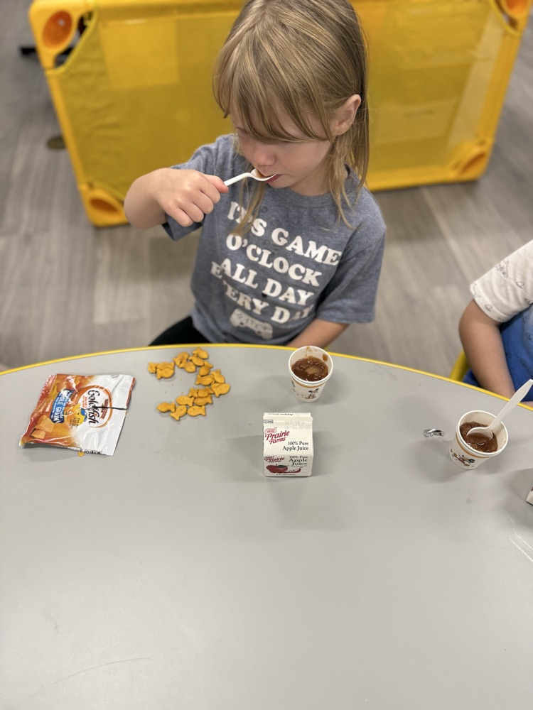 Trying our delicious applesauce!