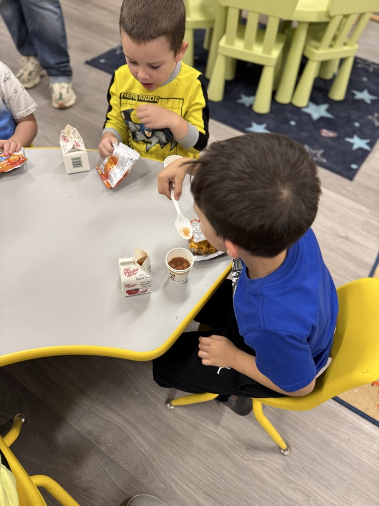 Sampling our delicious applesauce!