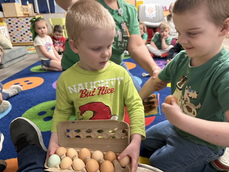 Josiah and Franklin showing us the eggs they brought