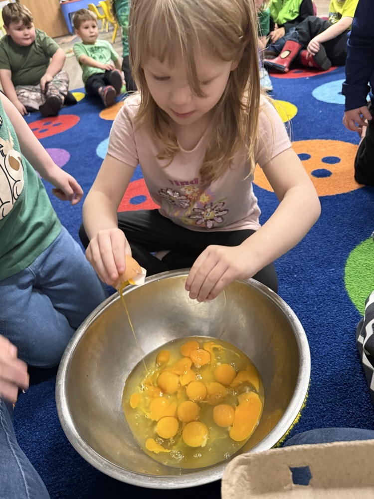 Helpong stir the eggs