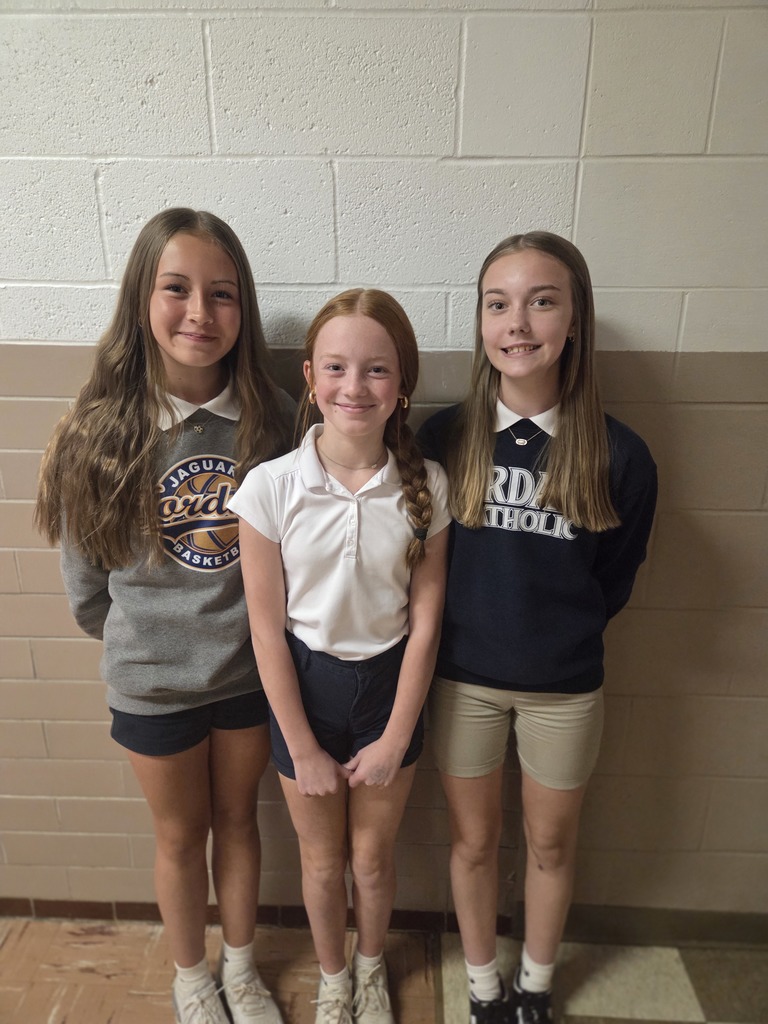 photo of 3 cross country runners at school