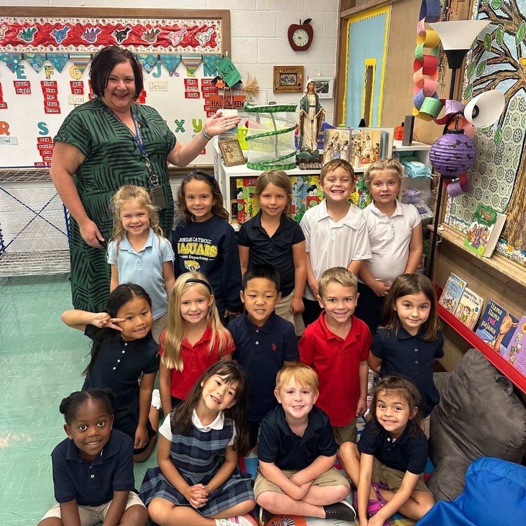 group photo of students with butterfly