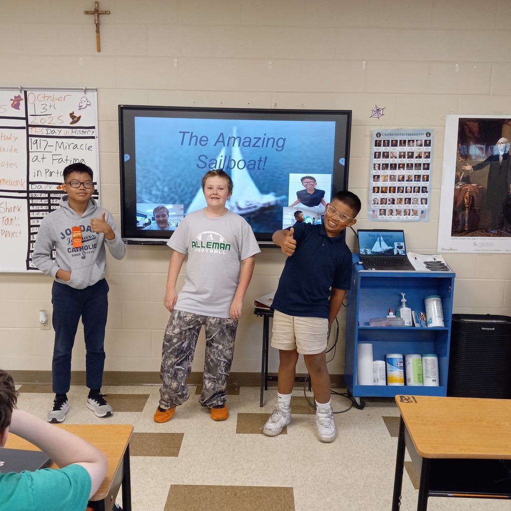 student posing with presentation