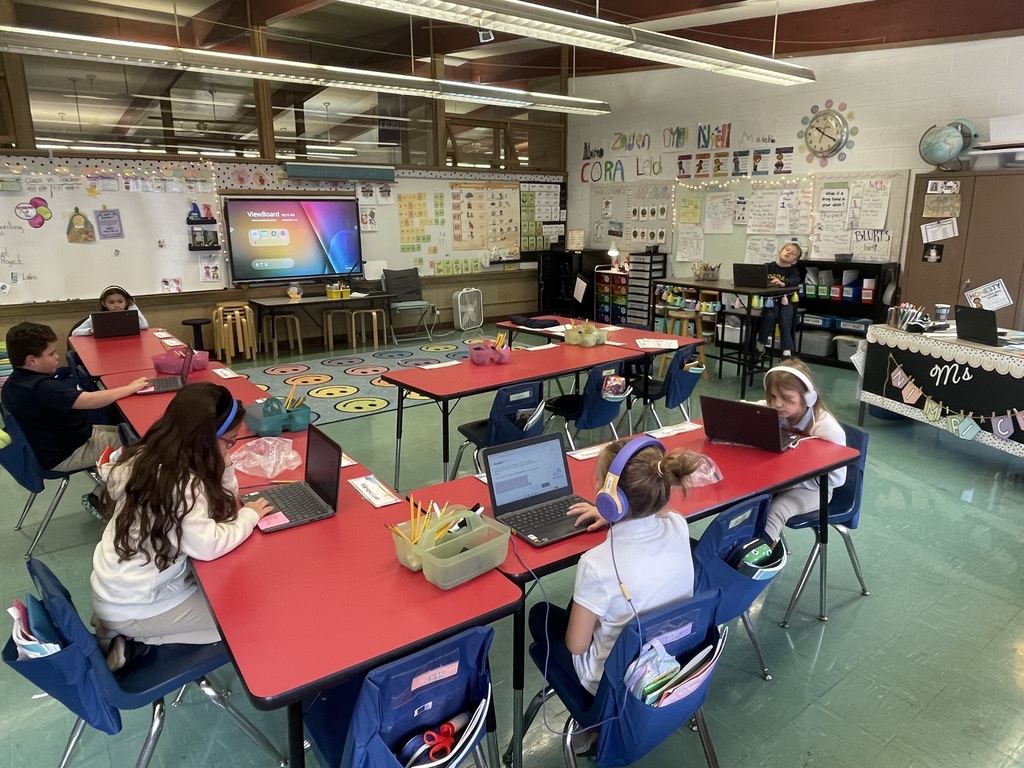 students working at their tables