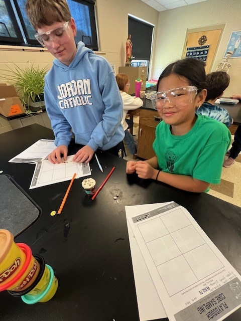 students taking core samples from playdoh