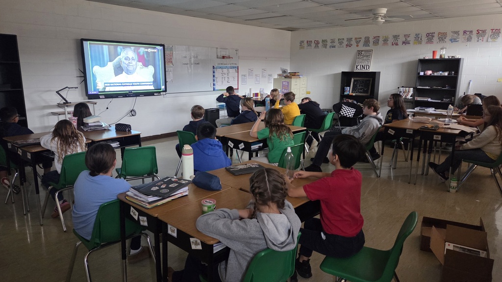 students watching Pope Leo on livestream