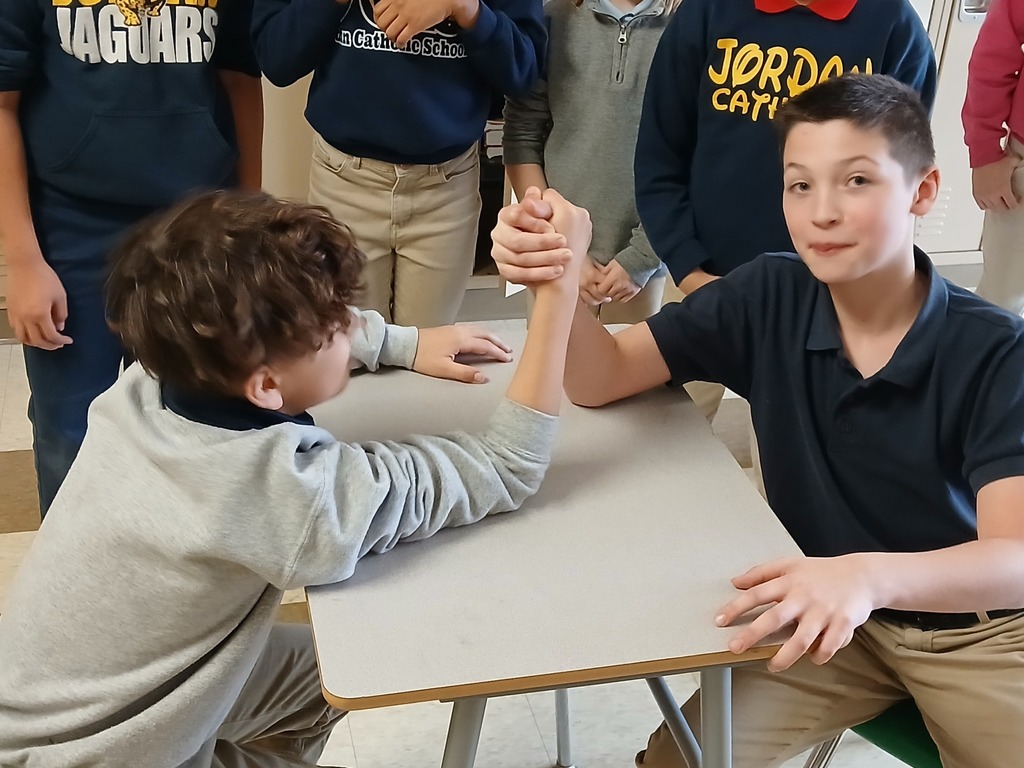 arm wresting on a desk