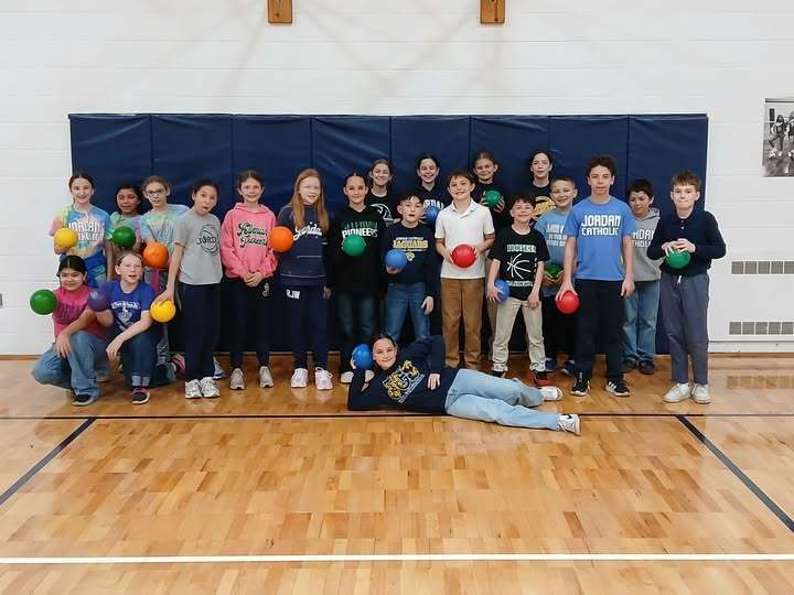 group photo of 5th grade in gym