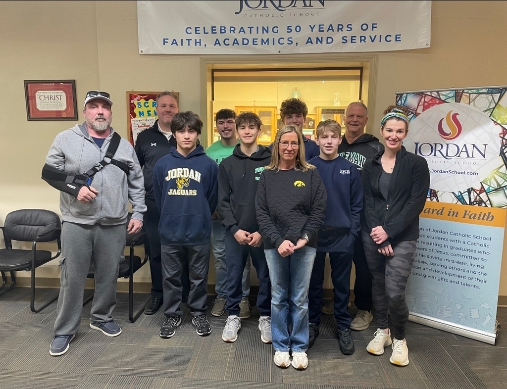 Group photo of wrestlers and their parents