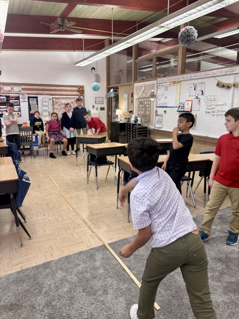 students testing paper airpanes