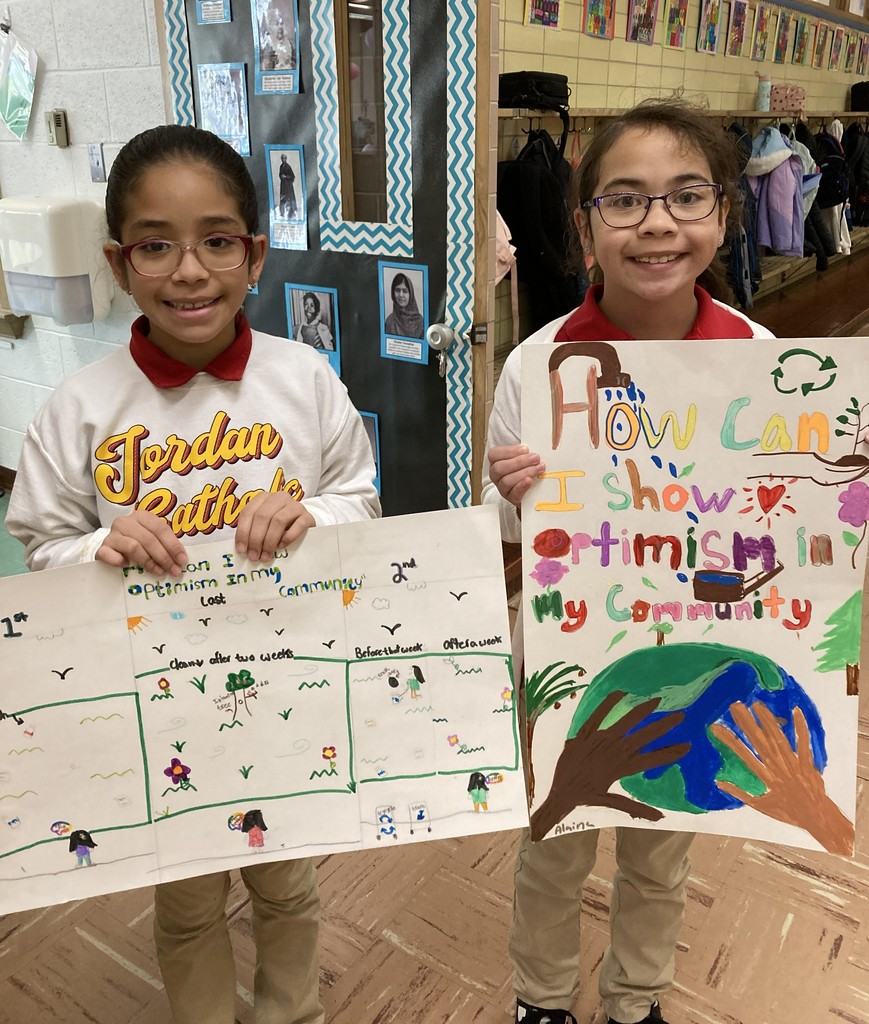 students posing with their winning posters