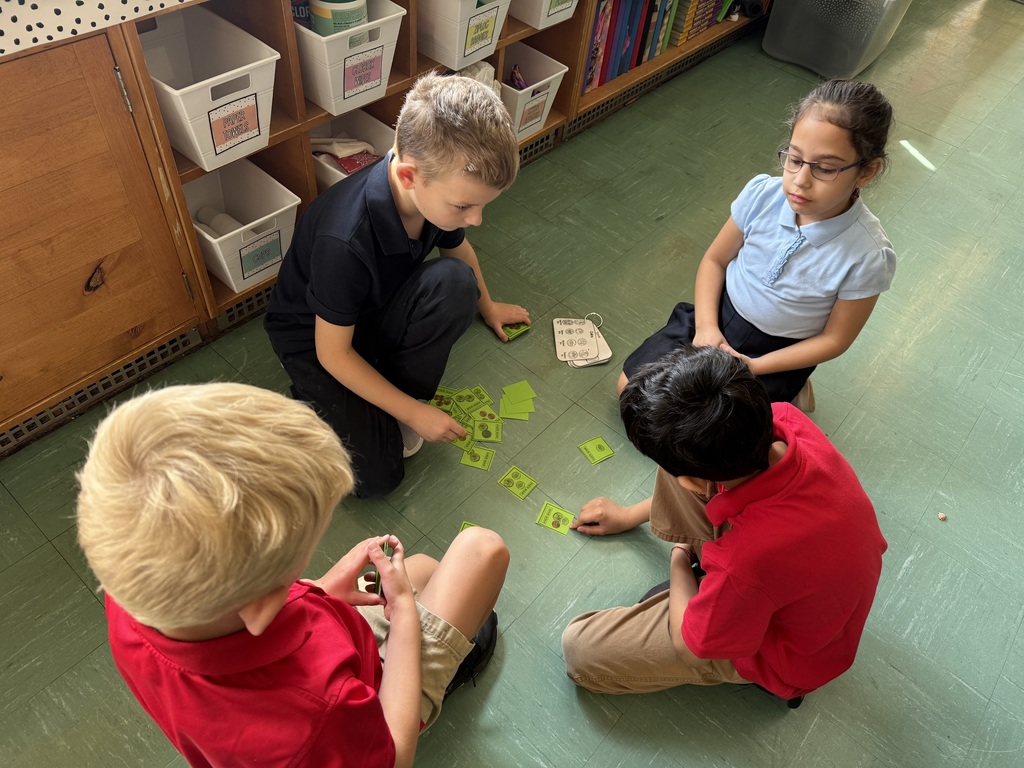 students playing a game on the floor