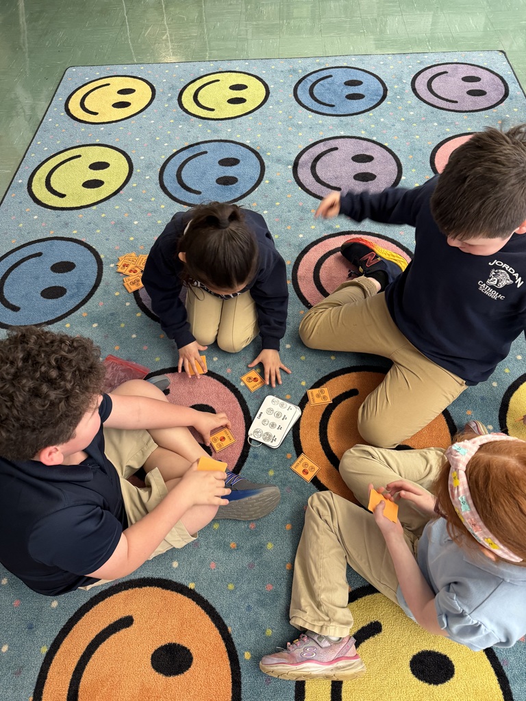 students playing a game on the floor