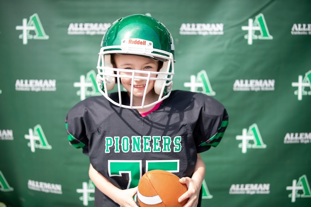 student in football gear