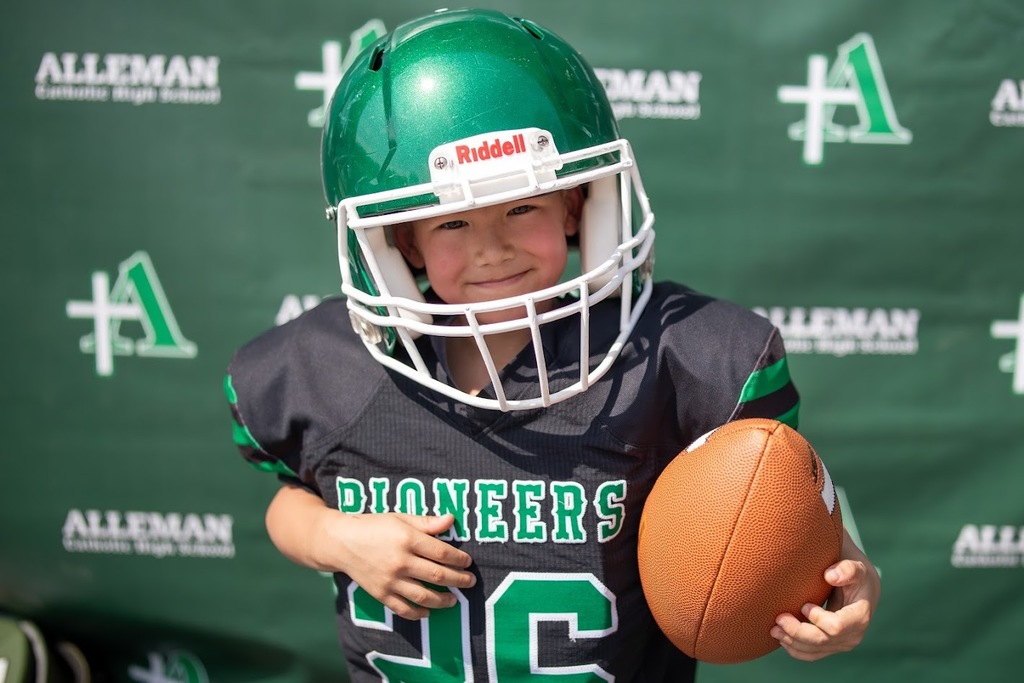 student in football gear