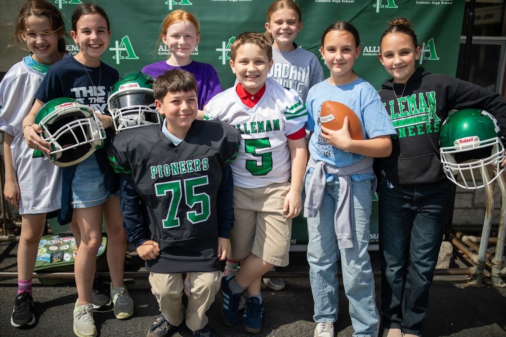 students with football gear