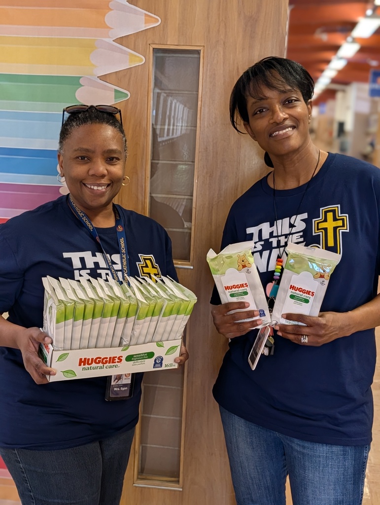 two teachers posing with Huggies Baby Wipes