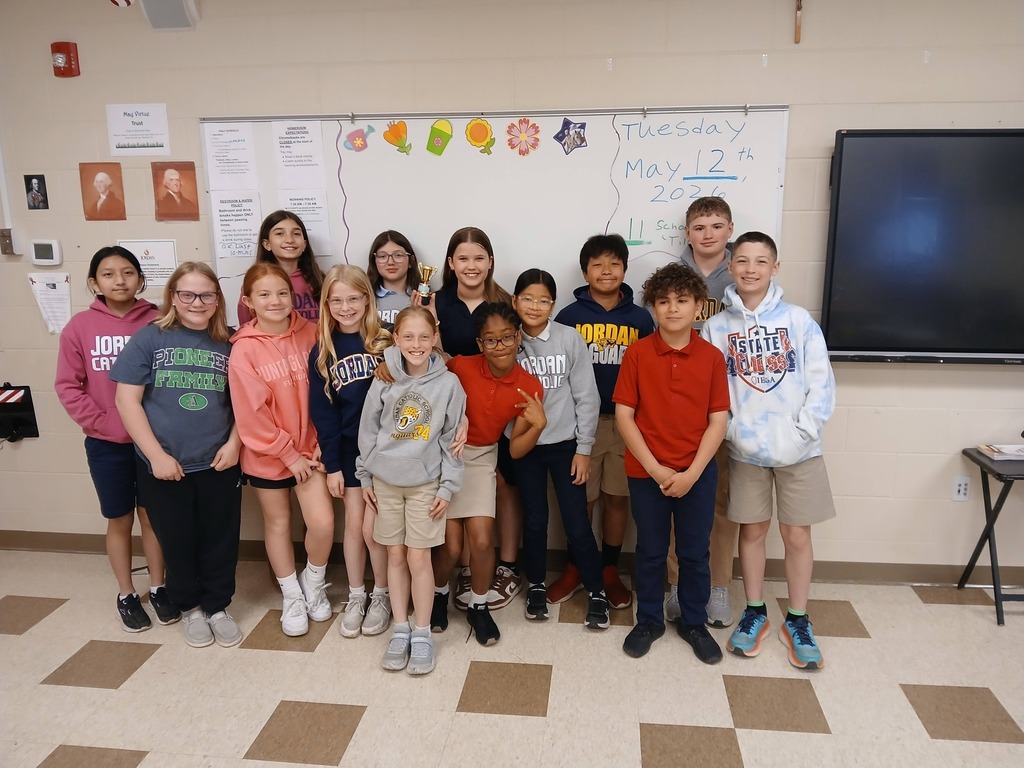 group photo of students in a classroom