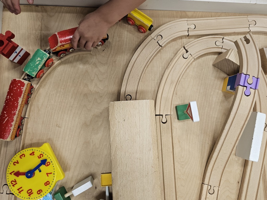 preschool playing with trains