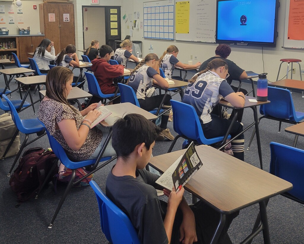 A class full of students enjoy reading time.