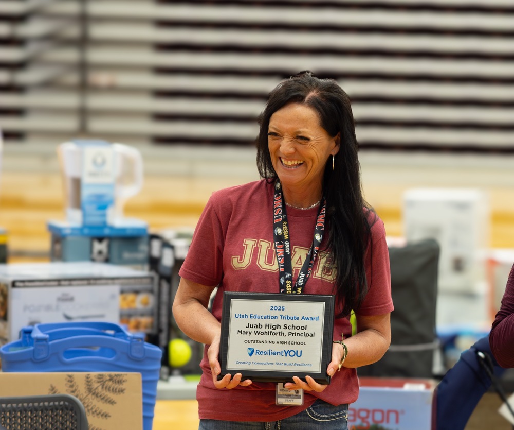Principal Wohlforth Accepts the ResilientYOU Award on behalf of Juab High School