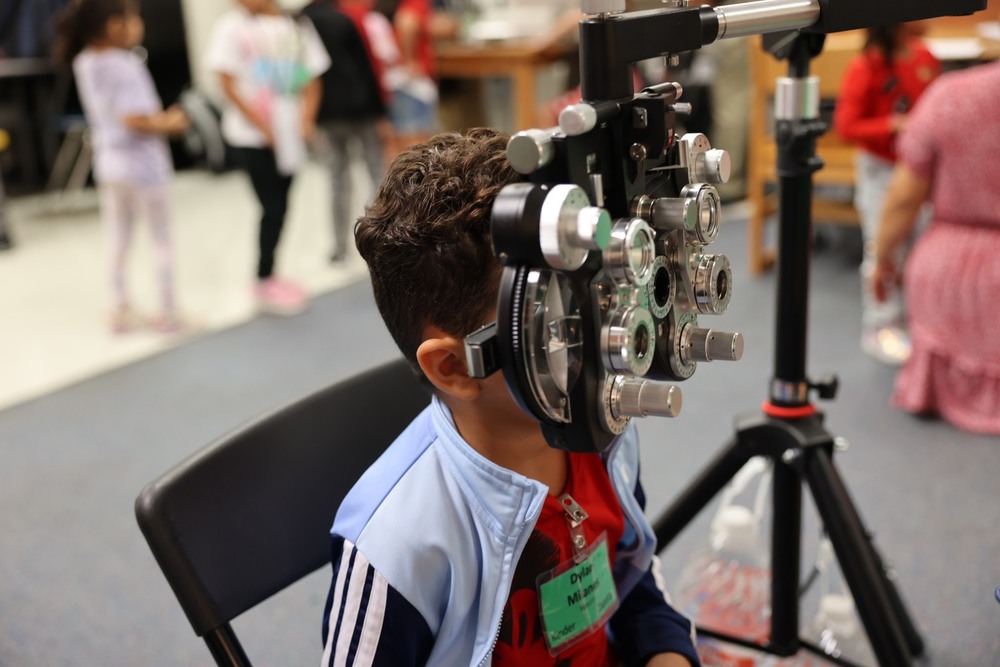 Little boy getting an eye exam