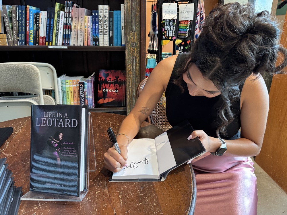 Woman signing book