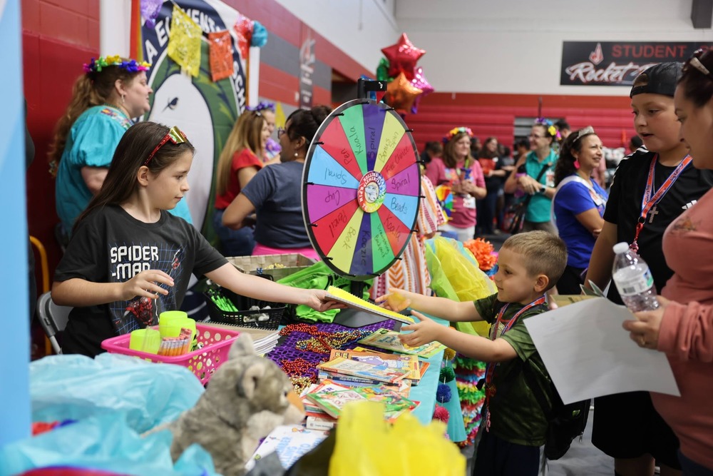 Children with books and games