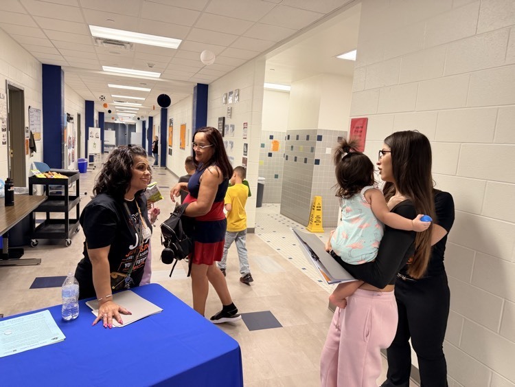 Dr de la Pena greets Senior student and family