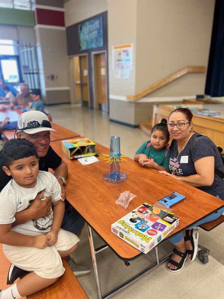 four people playing a game