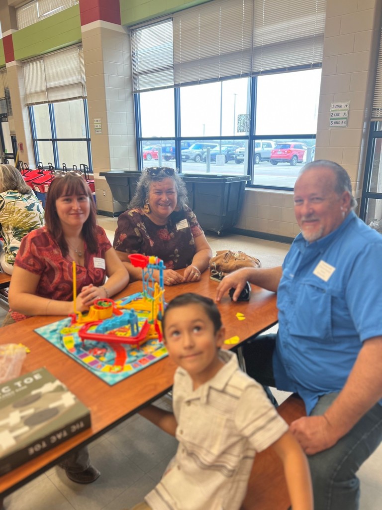 four people playing a game