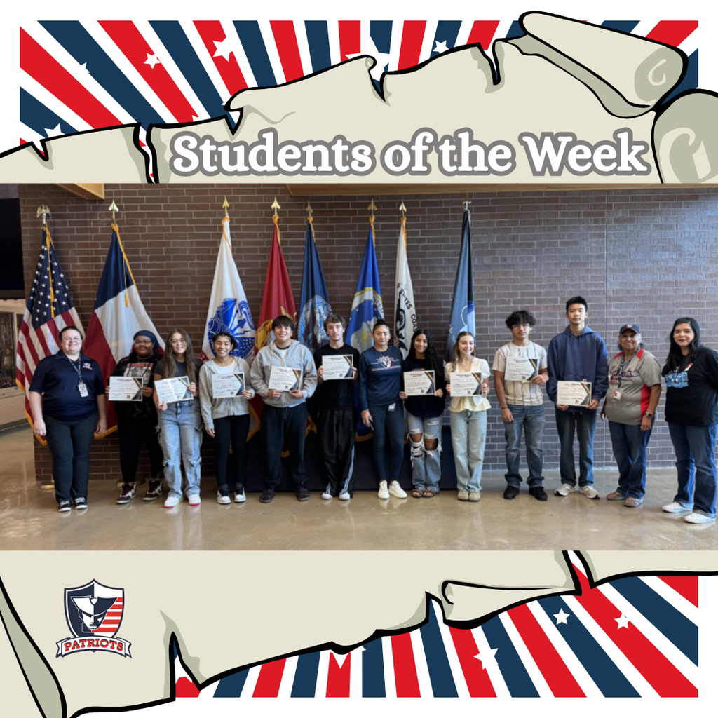 Nine students standing with four staff members in front of the flags in the VMHS foyer