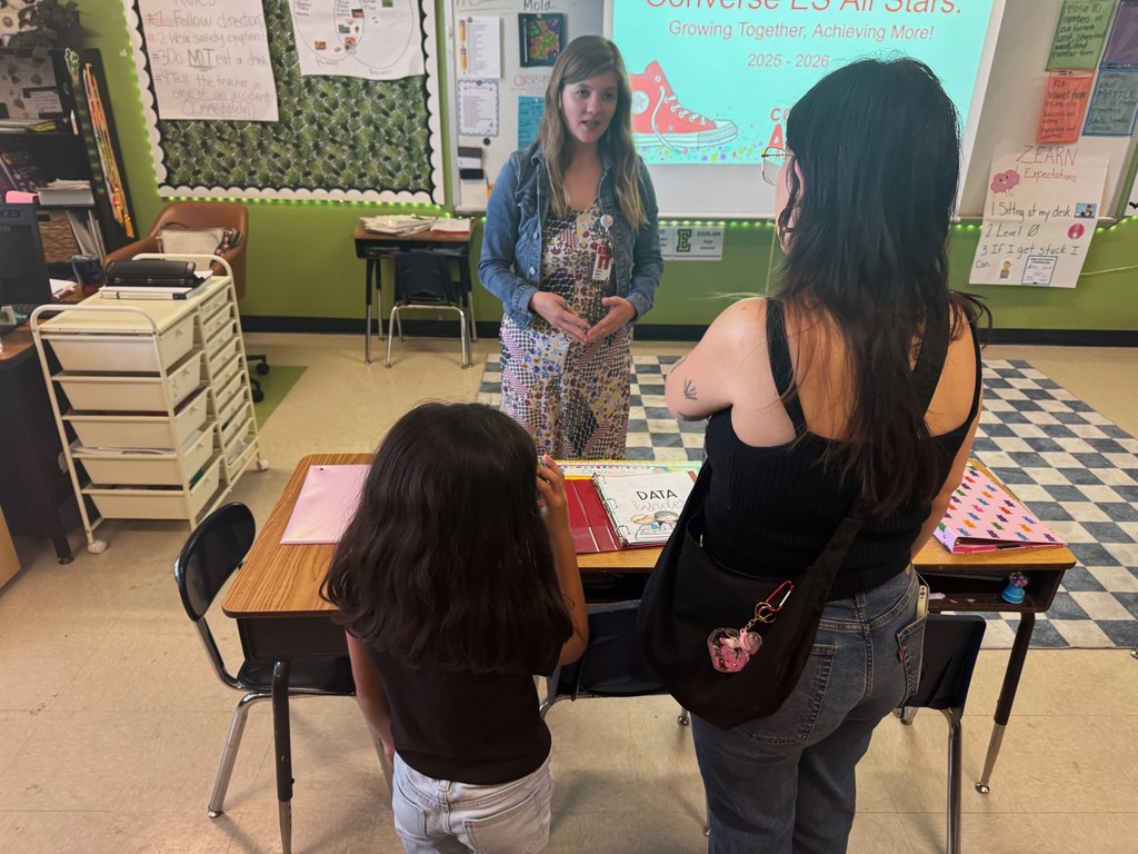parent talking to a teacher