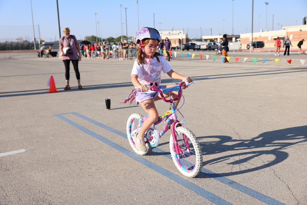 Student riding a bike 