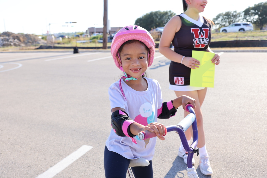 Student riding a bike 