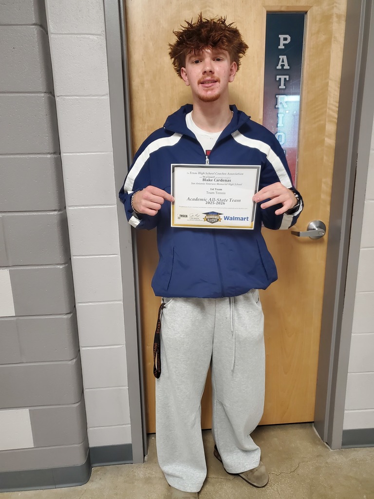 photo of Blake holding his certificate