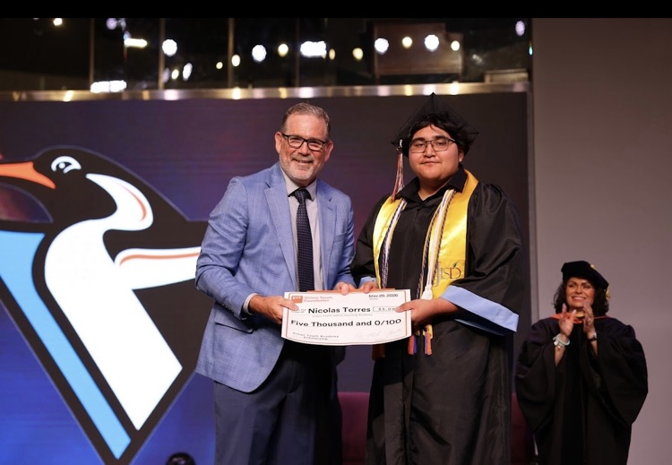 Dr.Mike Gustin SYF President presents Nicholas his $5K scholarship 