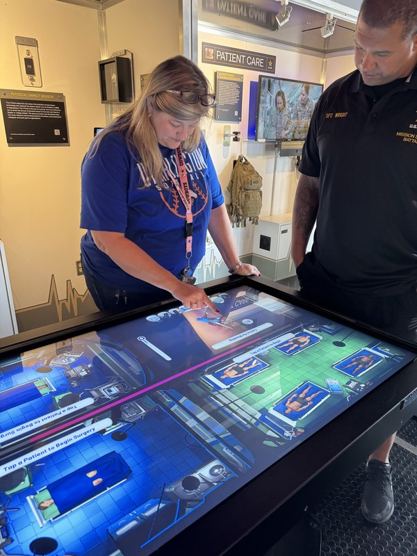 Dr. Arredondo interacting with exhibit